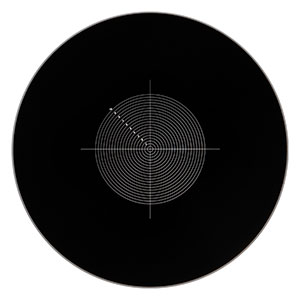 R1DS2N2 - Negative Concentric Circles & Crosshair Reticle, Ø1in, 0.5 mm Pitch, 10 µm Thick Lines, 20 Circles, UVFS